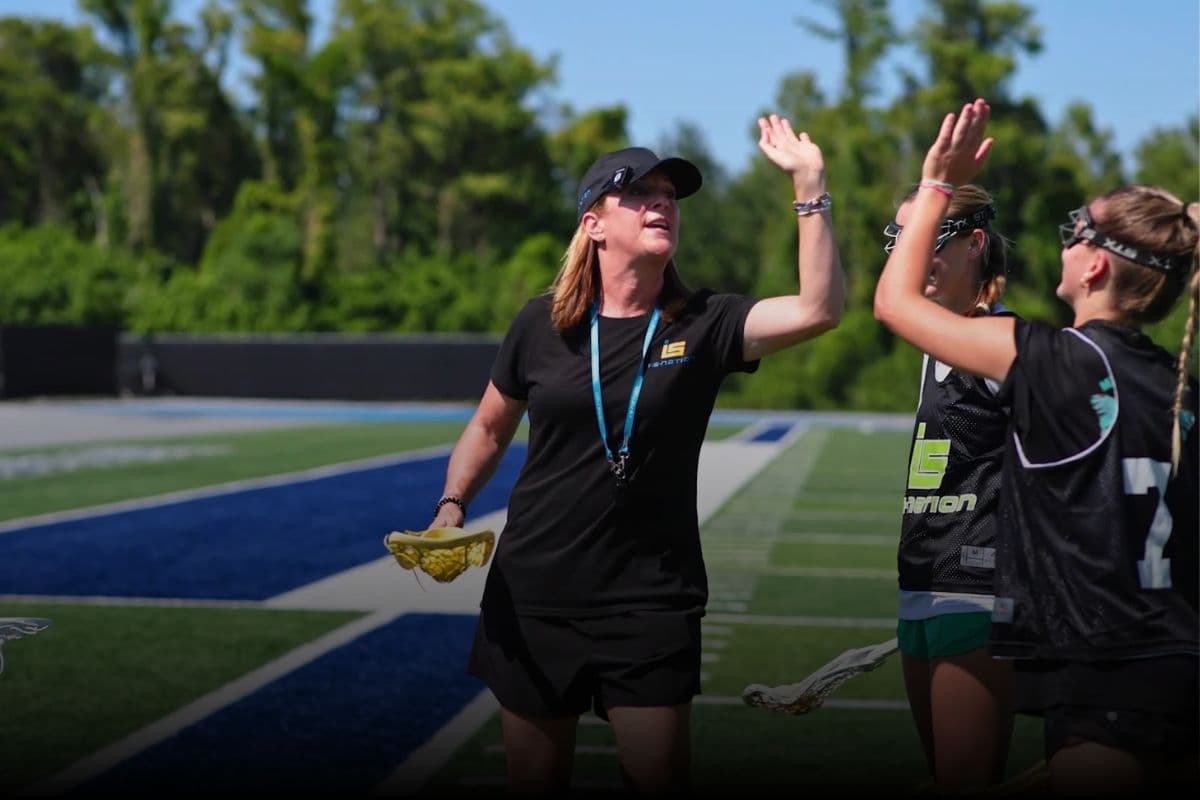 Athletes celebrating together on field