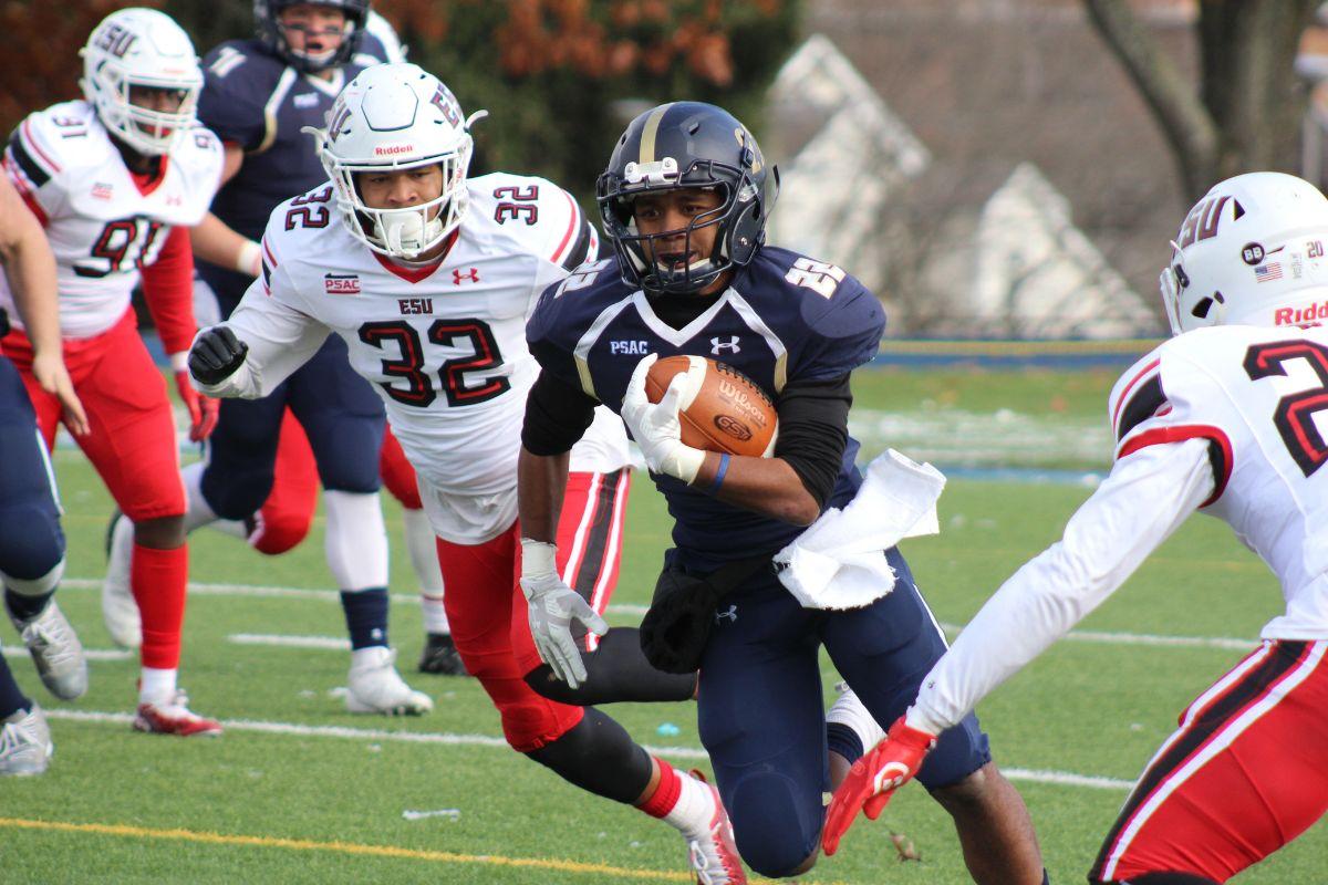 Football player running with ball